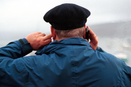 Peter Kenyon "Negotiating" on his mobile