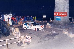 In car action … The Philips logo going round the Millennium stage on the special course car, with David Jordan on board